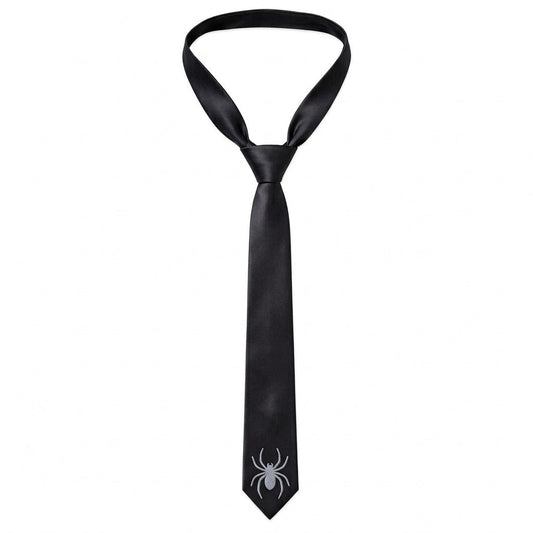 A black satin necktie with a silver spider emblem on the tip, displayed on a solid white background.